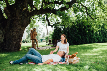 Happy Couple Having Picnic Together Outside