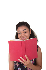 Young woman holding a book isolated on white