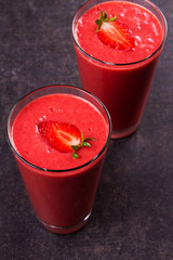 Berry smoothie garnished with strawberry