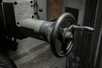 Focus on handles from machine for industry; note shallow depth of field