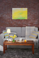 Beautiful interior with yellow narcissus of living room
