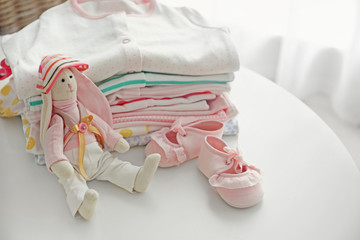 Pile of baby clothes, close up