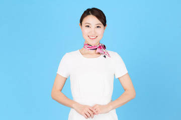 portrait of asian business woman isolated on blue background
