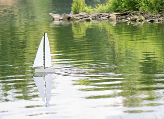 Sailing boat in a pond