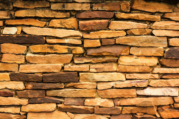 Old stone brick wall background.