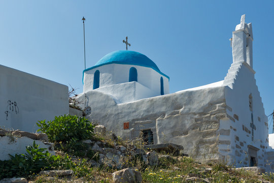 White chuch with blue roof in town of Parakia, Paros island, Cyclades, Greece