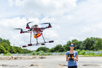 Woman flying drone