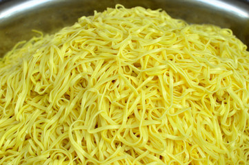 Chinese yellow noodles in kitchen