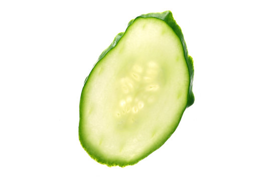 sliced cucumber close up in white