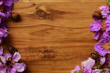 flower frame on wood background