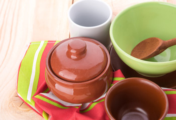 plates and cups on wooden table