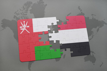 puzzle with the national flag of oman and yemen on a world map background.