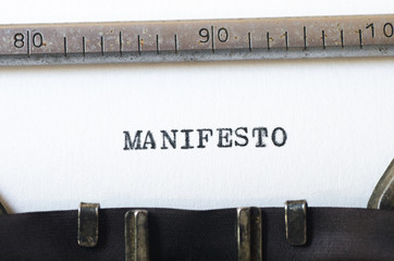 word manifesto typed on typewriter - obrazy, fototapety, plakaty