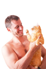 Portrait young attractive man hugging red cat