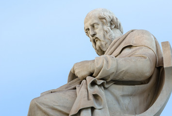 Fototapeta na wymiar Marble Statue of the Ancient Greek Philosopher Plato on Sky Background 