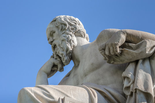 Closeup Statue of the Philosopher Socrates on Sky Background 