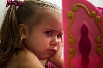 beautiful little girl, showing emotions, crying, offended Princess