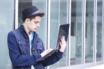 young man with laptop