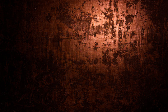 old scary rusty rough golden and copper metal surface texture/background for Halloween or haunted house games background/texture of wall