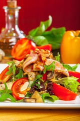 Warm mushroom salad with chilli and tomatoes