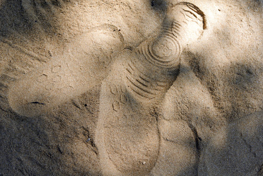texture of sand. footprints in the sand.
