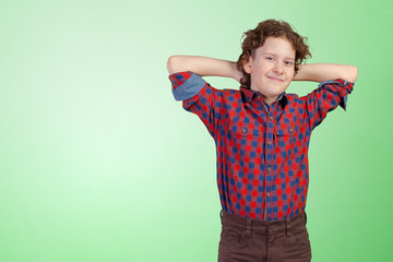 Fototapeta premium Portrait of little boy with hands folded