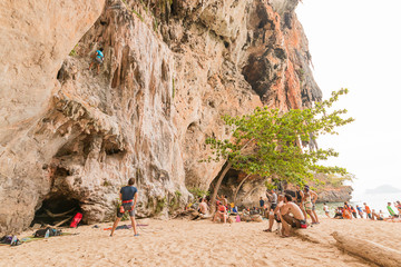 Fototapeta premium RAILAY, THAILAND - May 4, 2016: Rock climbers climbing the wall