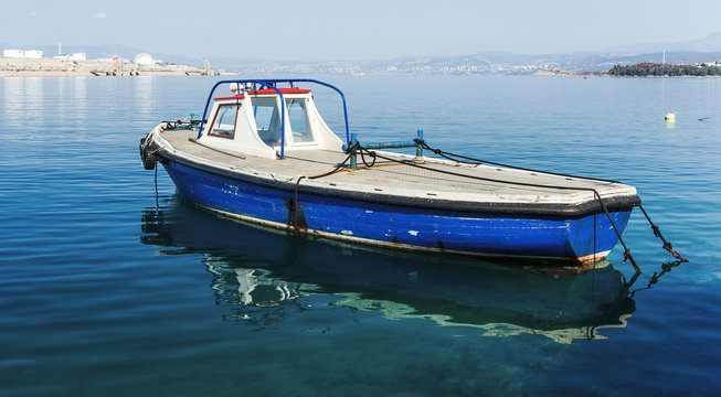 fishing boat parked at the mediterranean sea