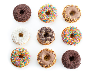 various donuts on white background