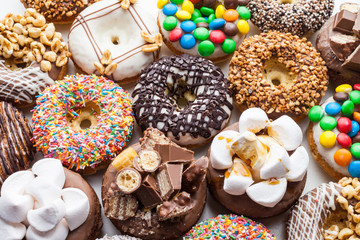 Close up of a selection of colorful donuts.