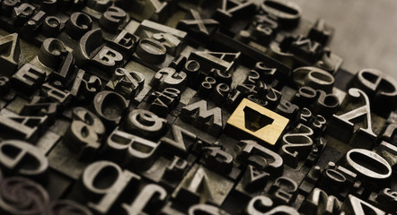 Historical letterpress types, also called as lead letters. These kind of letters were used in Gutenberg presses. These letters were the beginning of typography. And were used in typesetting - obrazy, fototapety, plakaty
