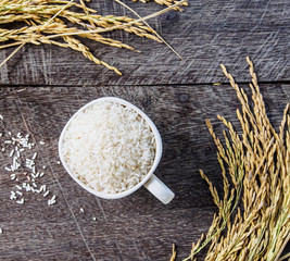rice in white cup and spike