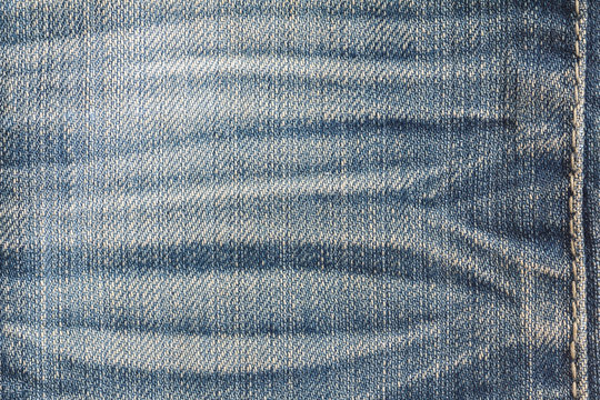Closeup denim jeans texture or denim jeans background for design with copy space for text or image.