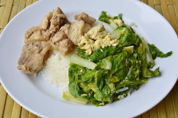 stir fried Chinese cabbage with egg and salty chicken on rice