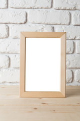 blank black picture frame on the wall