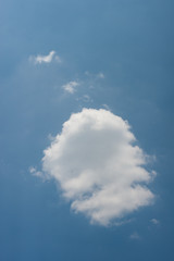 Light white clouds in the blue sky
