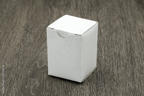 Download "Blank white box mock up on wood background" Stock photo ...