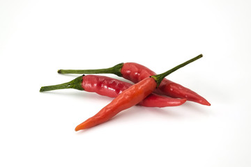 Handful of red hot Thai chili papers on white background