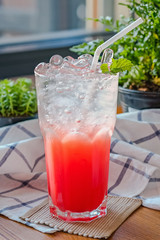 Fruit punch cocktail on a decorative background