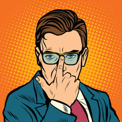 The man adjusts her glasses