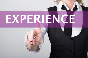 experience written in search bar on virtual screen. Internet technologies in business and home. woman in business suit and tie, presses a finger on a virtual screen