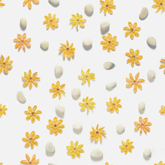 Seamless, yellow flowers and white pebbles stones, vintage tone