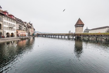 Fototapeta premium Holiday in Europe - Beautiful foggy view of winter landscape in Lucerne, Switzerland