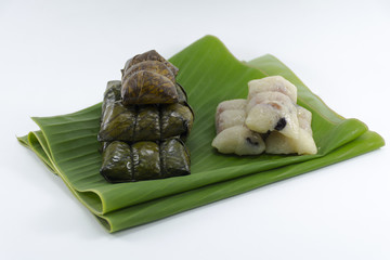 Dessert from banana leave Koaw-tom-mud isolated on white background snack original of Thai.