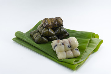 Dessert from banana leave Koaw-tom-mud isolated on white background snack original of Thai