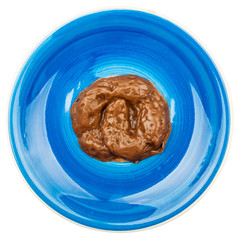 Fake excrement in a plate