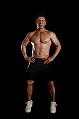 Fototapeta na wymiar 40s hispanic sport man and bodybuilder in gym corporate pose with naked torso muscular body