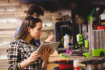 Graphic designer using digital tablet