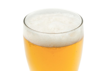 amber beer in pint glass on white background