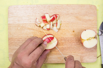 chef cutting apple